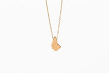 Load image into Gallery viewer, Geo bim necklace in gold vermeil displayed on white background, close up
